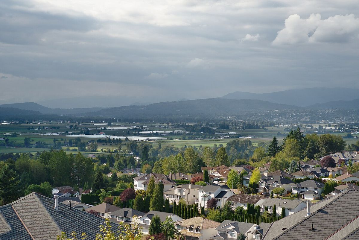 View from Whatcom Rd at McKee Rd, in Abbotsford, British Columbia, Canada looking towards Mission, BC. In the distance Mission Bridge is vis