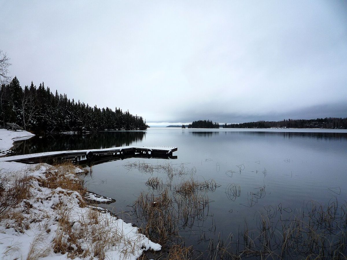 View of Lake Athapapuskow from Bakers Narrows, near Flin Flon, Manitoba. As can be seen, the region occasionally gets snow even in late May.