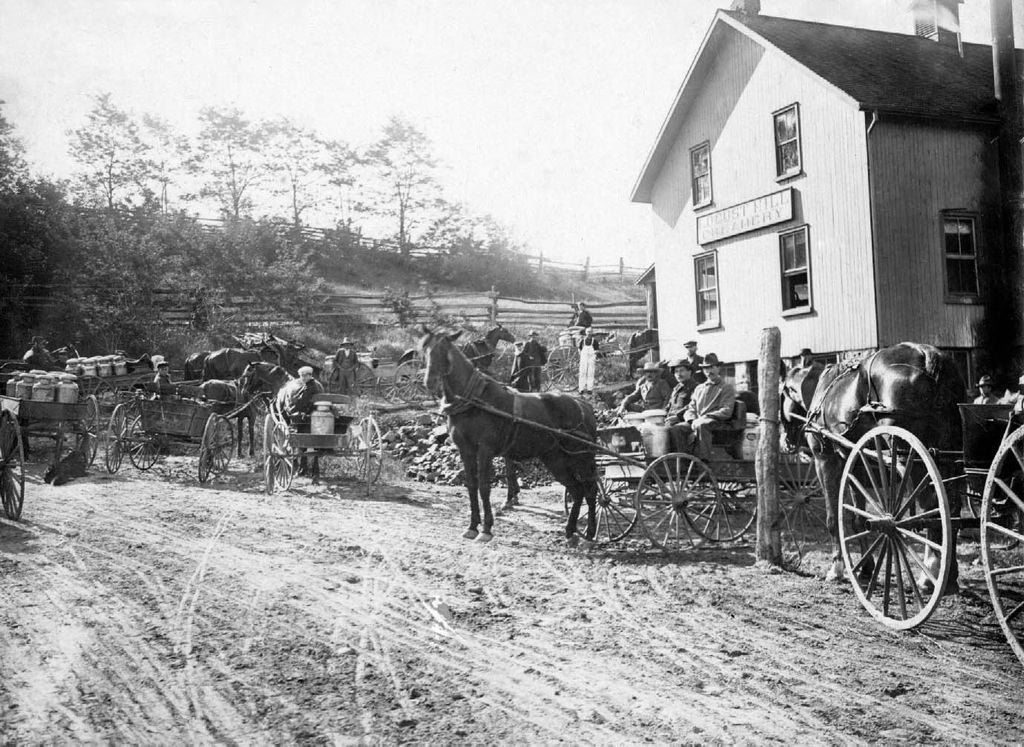 Farmers lined up to sell cream at Albert Reesor's Locust Hill Creamery - Markham, Ontario, Canada.