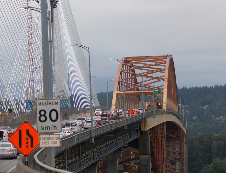The old Port Mann bridge with its under-construction replacement rising beside it.