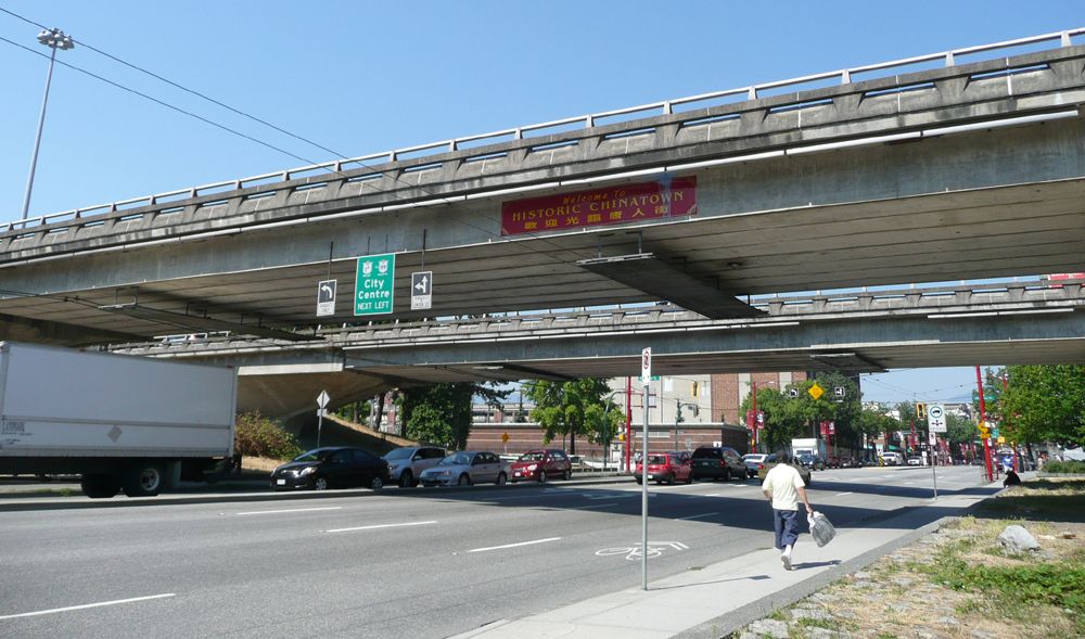 Georgia and Dunsmuir Viaducts at Main Street, to the south of Vancouver's Chinatown. Note "Welcome to Historic Chinatown" signage on the via