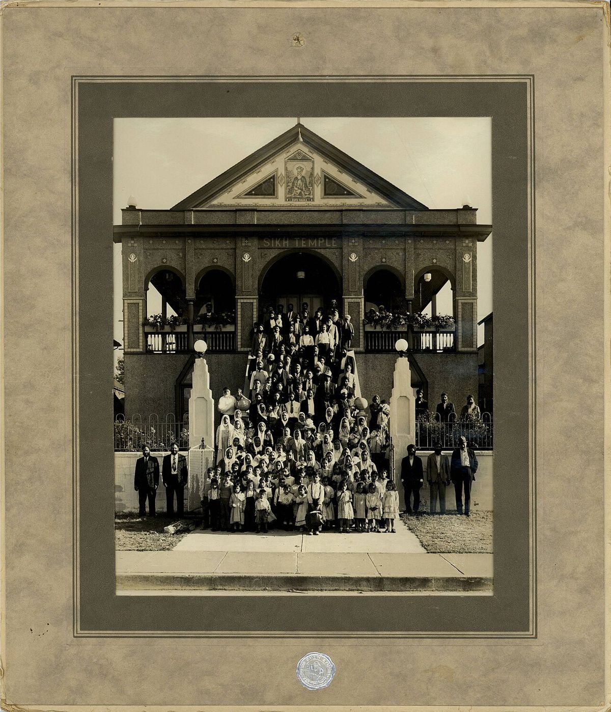 The Khalsa Diwan Society of Sikhs in front of the Sikh Temple at 2nd Avenue in Vancouver. Dating: This photograph is unlikely to date to 191