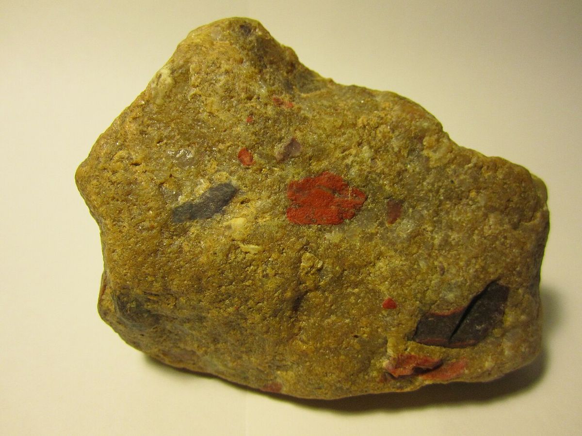 A sample of jasper conglomerate rock or "puddingstone" sourced from St. Joseph Island, Ontario. The glacial erratic rock is distinctive for 