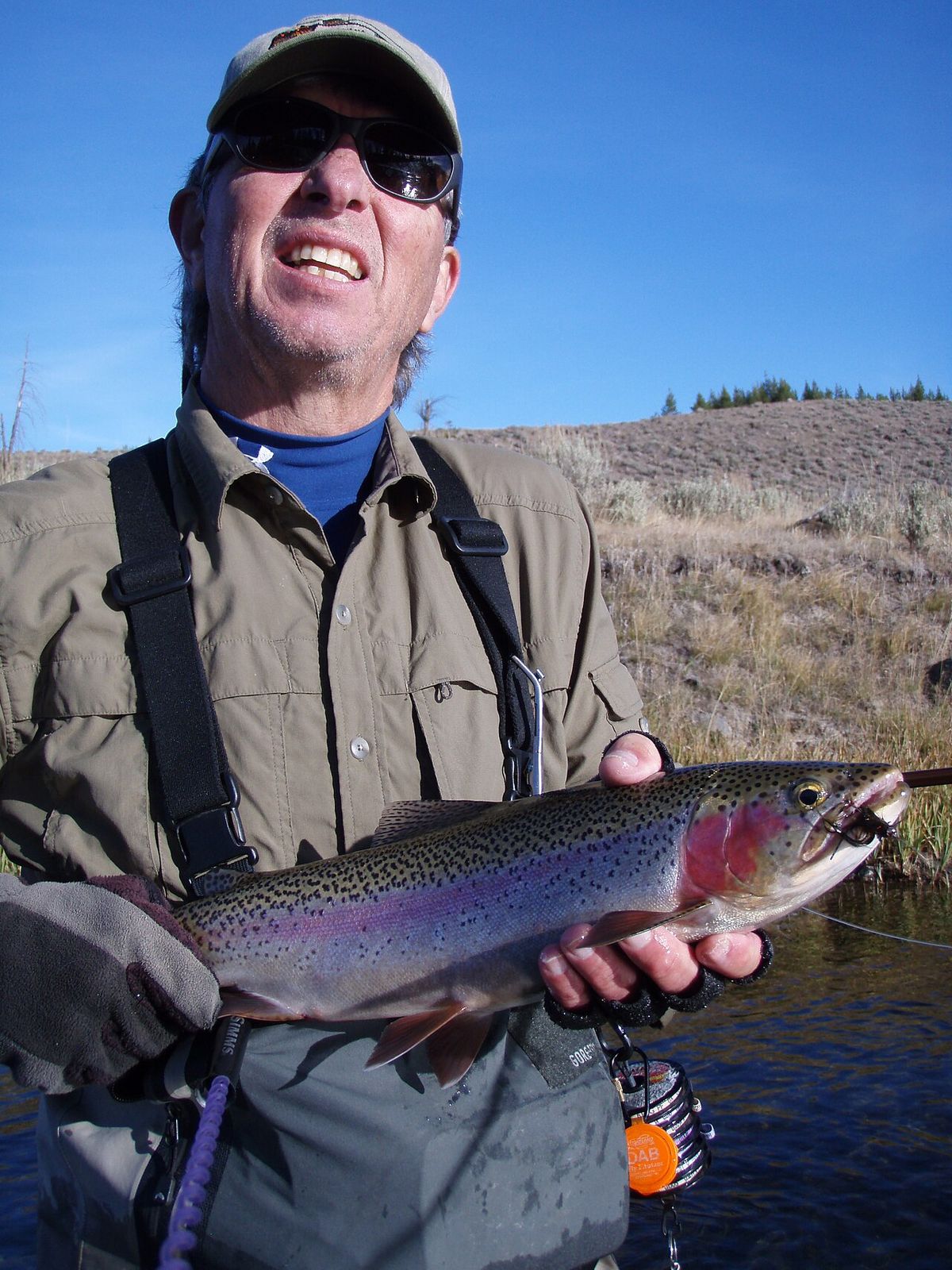 Fly fishing caught this rainbow trout on the Madison River — in Yellowstone National Park.